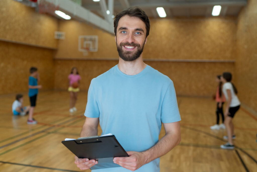 medium shot teacher holding clipboard