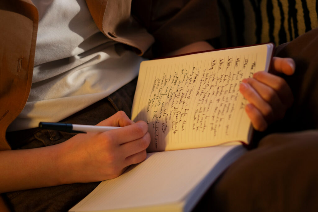 side view woman with journal home